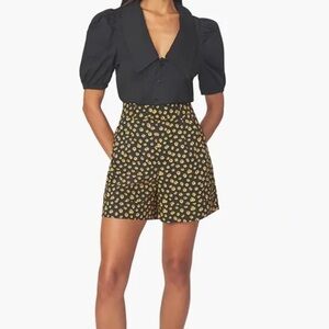 Revolve WeWoreWhat Black and Ditsy Daisy Romper Size XS